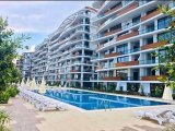 GİRNE ŞEHİR MERKEZİNDE ULTRA LÜKS SİTE İÇERİSİNDE HAZIR KİRACILI YATIRIMLIK 2+1 DAİRE
