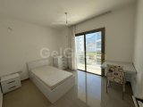 KIBRIS GİRNE MERKEZ'DE HAVUZLU SİTE İÇERİSİNDE KISMİ EŞYALI SATILIK 2+1 DAİRE