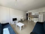 KIBRIS GİRNE MERKEZ'DE HAVUZLU SİTE İÇERİSİNDE KISMİ EŞYALI SATILIK 2+1 DAİRE
