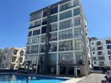 KIBRIS GİRNE MERKEZ'DE HAVUZLU SİTE İÇERİSİNDE KISMİ EŞYALI SATILIK 2+1 DAİRE