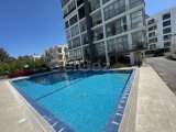 KIBRIS GİRNE MERKEZ'DE HAVUZLU SİTE İÇERİSİNDE KISMİ EŞYALI SATILIK 2+1 DAİRE