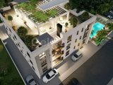KIBRIS GİRNE ALSANCAK BÖLGESİNDE EBEVEYN BANYOLU VE HAVUZLU SATILIK 2+1 DAİRE
