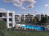 KIBRIS GİRNE LAPTA BÖLGESİNDE DAĞ VE DENİZ MANZARALI HAVUZLU SİTE İÇERİSİNDE SATILIK 1+1 DAİRELER