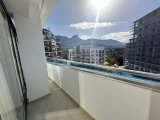 Girne Şehir Merkezinde Deniz ve Şehir Manzaralı 3+1 Yeni Daire Satılıktır.