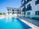 Alsancak'ta yüzme havuzlu rahat bir sitede 81 m2 2 odalı daire