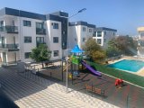 Alsancak'ta yüzme havuzlu rahat bir sitede 81 m2 2 odalı daire