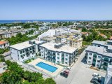 Alsancak'ta yüzme havuzlu rahat bir sitede 81 m2 2 odalı daire