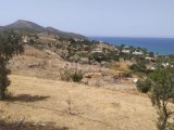 Deniz ve dağ manzaralı arsa
