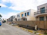 GİRNE DOĞANKÖY'DE ŞEHİR İÇİNDE 2+1 BEGONVİL EVLERİ TATİL EVİ TARZIYLA DİKKAT ÇEKİYOR!!
