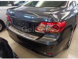 COROLLA 2013-2016 IÇIN UYUMLU ARKA TAMPON ÜST KAPLAMA INCE MODEL