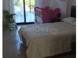 ÜÇ YATAK ODALI - ORTAK HAVUZLU - BAHÇE KATI DAİRE