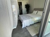 Girne'nin Merkezinde Türk Tapulu Lüks Satılık Full Eşyalı Residence Daire
