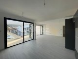 ALSANCAK'TA SATILIK ÇATI KATI VE ÇATI TERRASLI PENTHOUSE