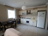 PATARA ŞEHİR'DE SATILIK BİR DAİRE, BİR ARTI BİR DÖŞENMİŞ APARTMAN