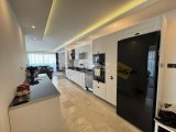 GİRNE MERKEZDE FULL EŞYALI ÜÇ YATAK ODALI SATILIK DAİRE