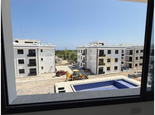 Girne Lapta, Oteller Bölgesinin üstünde Sıfır Satılık 2+1 ve 3+1 Daire 130.000 STG Başlayan Fiyatlar ile / +90533 881 09 02