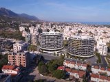 KKTC GİRNE MERKEZDE DENİZ VE DAĞ MANZARALI SATILIK 1+1 DAİRELER **