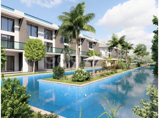 Kıbrıs İskele Long Beach Bölgesinde Bir Komplekste Satılık Bahçe Katı ve Çatı Teraslı 1+1 Daireler