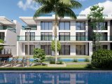 Kıbrıs İskele Long Beach Bölgesinde Bir Komplekste Satılık Bahçe Katı ve Çatı Teraslı 1+1 Daireler