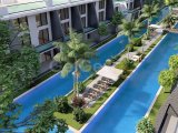 Kıbrıs İskele Long Beach Bölgesinde Bir Komplekste Satılık Bahçe Katı ve Çatı Teraslı 1+1 Daireler