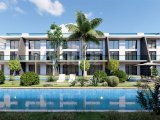 Kıbrıs İskele Long Beach Bölgesinde Bir Komplekste Satılık Bahçe Katı ve Çatı Teraslı 1+1 Daireler