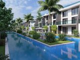 Kıbrıs İskele Long Beach Bölgesinde Bir Komplekste Satılık Bahçe Katı ve Çatı Teraslı 1+1 Daireler