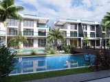 Kıbrıs İskele Long Beach Bölgesinde Bir Komplekste Satılık Bahçe Katı ve Çatı Teraslı 1+1 Daireler