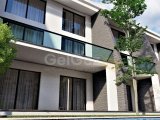 Kıbrıs İskele Long Beach Bölgesinde Bir Komplekste Satılık Bahçe Katı ve Çatı Teraslı 1+1 Daireler