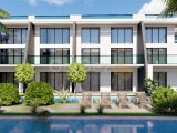 Kıbrıs İskele Long Beach Bölgesinde Bir Komplekste Satılık Bahçe Katı ve Çatı Teraslı 1+1 Daireler