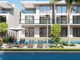 Kıbrıs İskele Long Beach Bölgesinde Bir Komplekste Satılık Bahçe Katı ve Çatı Teraslı 1+1 Daireler