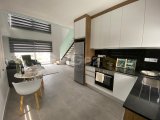 İskele, Kıbrıs'ta deniz sıfır ve dağ manzaralı, satılık 1+1 loft daire