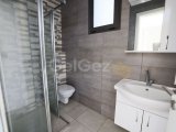 Girne'nin Merkezinde Ortak Havuzlu Bir Sitede Satılık Zemin Kat 3+1 Daire