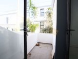 Girne'nin Merkezinde Ortak Havuzlu Bir Sitede Satılık Zemin Kat 3+1 Daire
