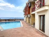 Kuzey Kıbrıs Girne'nin Karakum bölgesinde denize sıfır konumda satılık 2+1 daire
