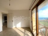 Kuzey Kıbrıs Girne'nin Karakum bölgesinde denize sıfır konumda satılık 2+1 daire