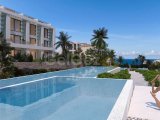 Kıbrıs Girne Esentepe de Denize 250 metre Benzersiz Ödeme Planlı 1+1 Penthouse Dublex Daireler
