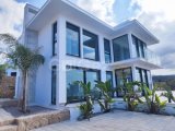 Esentepe - Girne: Eşsiz Manzarası ve Çağdaş Tasarımıyla Satılık Lüks 4+1 Villa