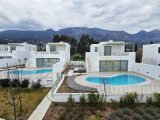 Girne Lapta'da Sahil Sitesi, Muhteşem Deniz Manzaralı, Beyaz Eşyalı 2+1 Daire Kiralık