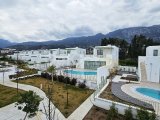 Girne Lapta'da Sahil Sitesi, Muhteşem Deniz Manzaralı, Beyaz Eşyalı 2+1 Daire Kiralık