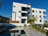 Kıbrıs Girne Alsancak ta Havuzlu Sitede Satılık Geniş 2+1 Bahçe Kat Daire