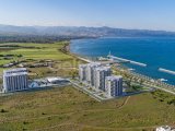 KKTC Lefke de Türk Tapulu Dedeman Hotel Resort Kalite ve İşletme Garantisi ile 10 Yıl TL ile Ödeyerek Denize Sıfır Ful Eşyalı 2+1 Residancelar
