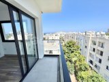 Girne Merkezde Eşsiz. Deniz Manzaralı Satılık 2+1 Daire