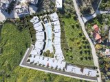 KIBRIS GİRNE LAPTA BÖLGESİNDE HAVUZLU SİTE İÇERİSİNDE BAHÇE KATI VEYA ÇATI TERASLI SATILIK 2+1 DAİRE