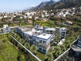 KIBRIS GİRNE LAPTA BÖLGESİNDE HAVUZLU SİTE İÇERİSİNDE BAHÇE KATI VEYA ÇATI TERASLI SATILIK 2+1 DAİRE