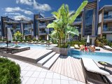 KIBRIS GİRNE LAPTA BÖLGESİNDE HAVUZLU SİTE İÇERİSİNDE BAHÇE KATI VEYA ÇATI TERASLI SATILIK 2+1 DAİRE