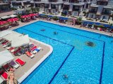 İskele Long Beach’te Denize Yürüme Mesafesinde, Ful Eşyalı, 50 Ay Vade ile Stüdyo Taşınmaya Hazır Daireler Seni Bekliyor