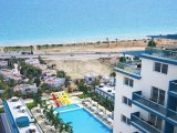 Kaçırılmayacak Kampanya İskele Longbeach de Denize Yürüme Mesafesinde Taşınmaya Hazır Ful Eşyalı 50 Ay Vadeli Stüdyo Daireler