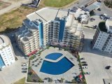 Kaçırılmayacak Kampanya İskele Longbeach de Denize Yürüme Mesafesinde Taşınmaya Hazır Ful Eşyalı 50 Ay Vadeli 1+1 Daireler