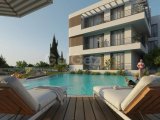 Kıbrıs Girne Lapta Bölgesinde Türk Tapulu Havuzlu Site İçerisinde Satılık 2+1 Daire