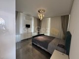 Girne, Çatalköy‘de dağ ve deniz manzaralı satılık 4 + 1 villa